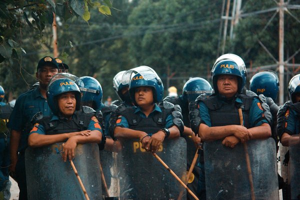 How do UK property insurance policies differ for urban and rural homes?